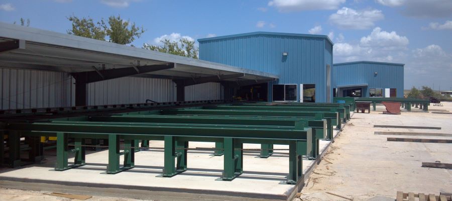 a design build shelter, drill house and saw house for 300ft structural steel beam line