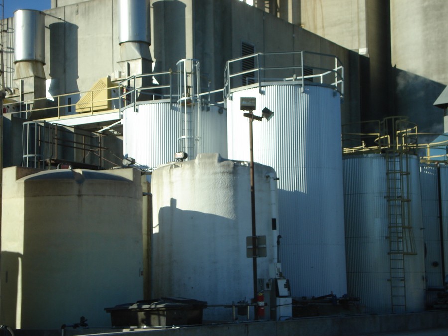 2 liquid fat storage tanks with steam heat trace